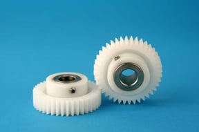 Powder metal and Plastic component assembly